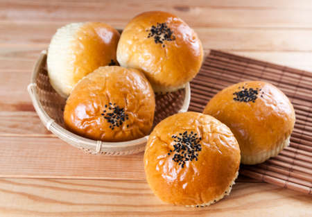 Wood grain situational background displaying delicious bread