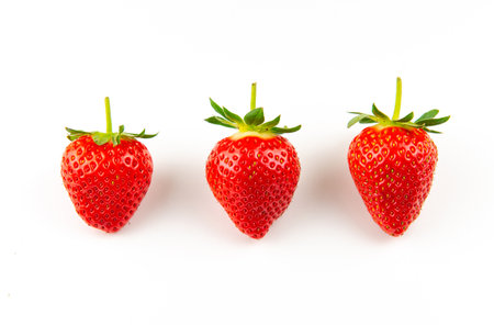 Strawberries over white backgroundの写真素材