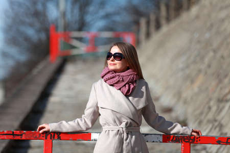 Beautiful blonde woman wearing winter jacketの写真素材
