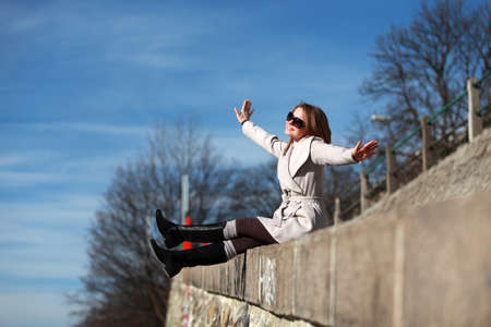 Beautiful blonde woman with winter bootsの写真素材