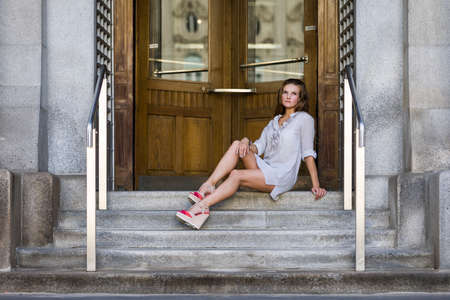 Young woman wearing blouse and shortsの写真素材