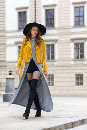Woman with over the knee boots and leather jacketの写真素材