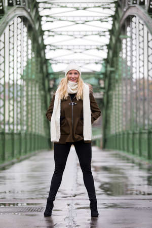 Beautiful blonde woman wearing winter jacketの写真素材