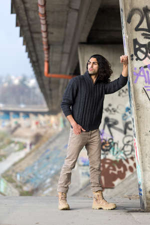 Handsome mediterranean man on streetの写真素材