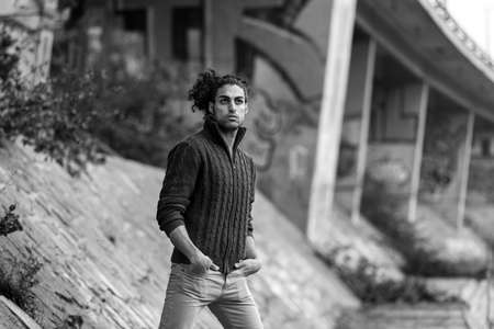 Handsome mediterranean man on streetの写真素材