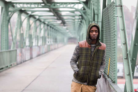 Handsome black man wearing casual clothes on streetの写真素材