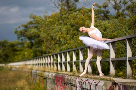 Dancing Ballerina wearing tutu on streetの写真素材