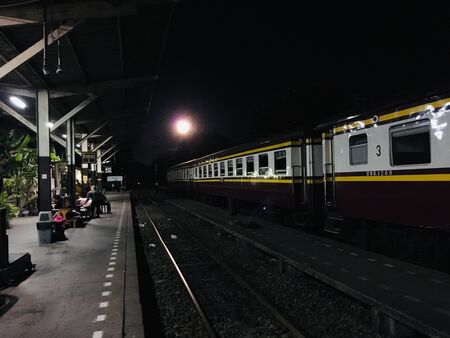 At train station, People waiting the train on sunrise time Bangkok, Thailandの写真素材