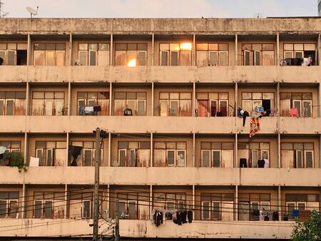 Part of outside apartment buildings structure, wall and windows as texture or for backgroundの写真素材