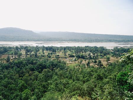 Landscape view point of low mountain, see forest river and valleyの写真素材