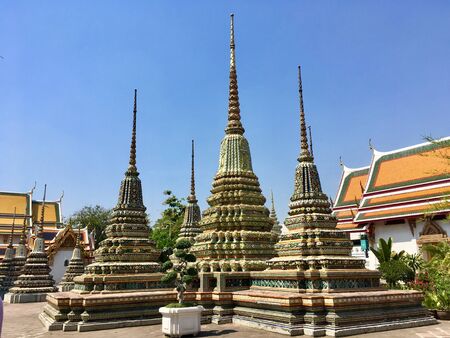Ancient Pagoda and Stupas decorate around external in Wat Pho temple in Bangkok, Thailandの写真素材