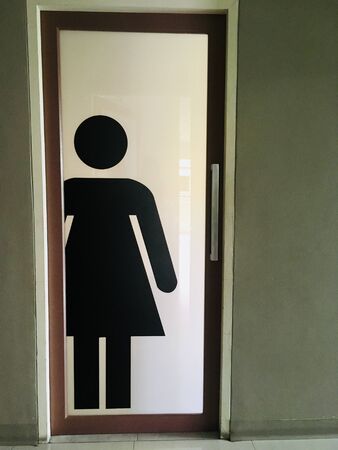 Women Restroom symbol on the door, female sign for rest roomの写真素材