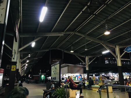 At train station, People waiting the train on sunrise time Bangkok, Thailandの写真素材