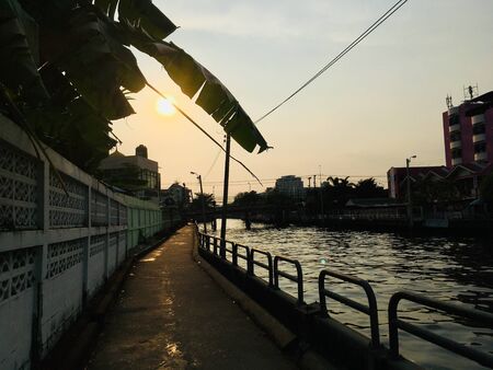 Corridor walking side Khlong Saen Saeb on sunset time, main canal transport in Bangkok, Thailandの写真素材