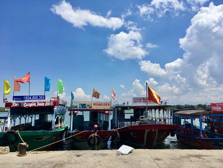 Local boat for cruising tourist on harbor at Hoi An ancient town, Danang, Vietnamの写真素材