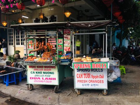 Vietnam street food style shop stand on side way local food at Hoi An ancient town, Vietnamの写真素材