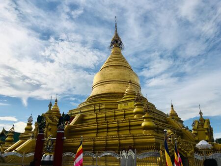Kuthodaw Pagoda, gloden buddhist stupa in Mandalay city, Myanmarの写真素材