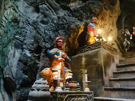 Buddha image and statue inside Huyen Khong cave at Marble mountains in Danang, Vietnamのeditorial素材