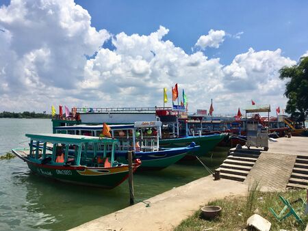 Local boat for cruising tourist on harbor at Hoi An ancient town in Danang, Vietnamの写真素材