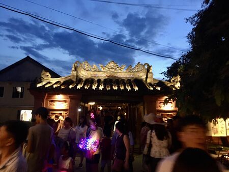 Hoi an ancient town in Vietnam on night scene, traveler move motion blurredの写真素材