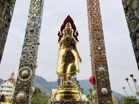 The Back of golden buddha image at Phra That Pha Son Kaew temple in Khao Kho mountain, Phetchabun province, Thailandの写真素材