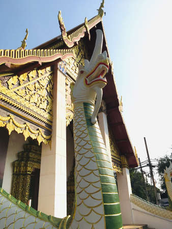 Beautiful finely of Ancient King of Naga statue, traditional Thai style decorative in templeの写真素材