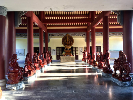 More buddha image wooden statue at Linh Ung pagoda temple in Danang, Vietnamのeditorial素材