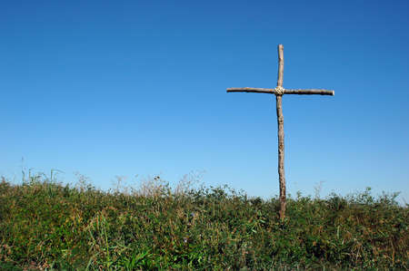 Wood rustic cross over blue skyの写真素材