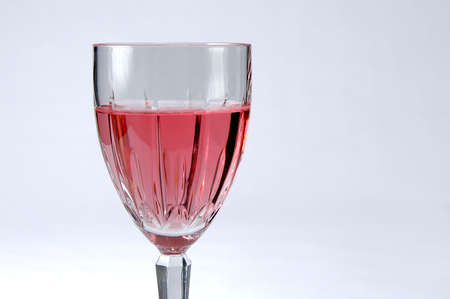 Glass of zinfandel wine over a neutral backgroundの写真素材