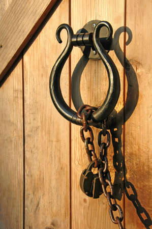 Vintage padlock and door handle detail