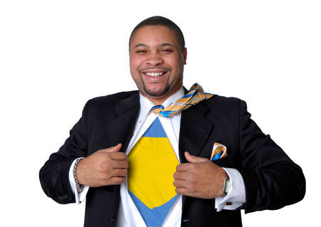 Superhero businessman opening shirt to show his true identity.の写真素材