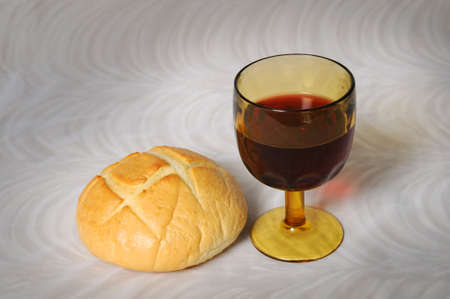 Communion simbolized by bread and wineの写真素材
