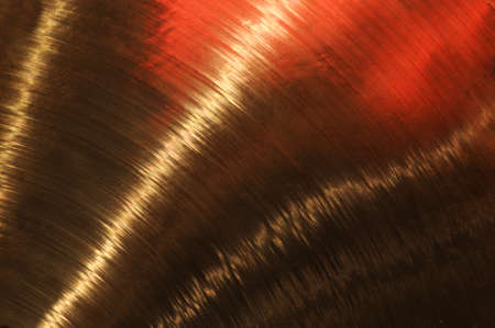 Brass background with reflections.の写真素材