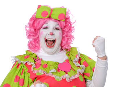 Clown showing excitement by pumping fist into the air