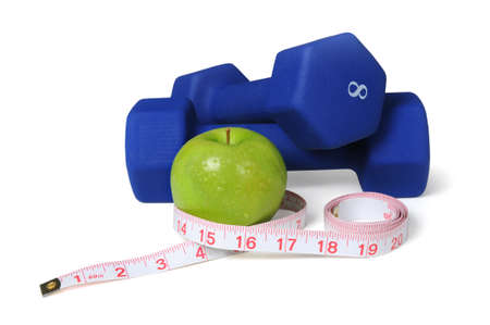 Bumbells, measuring tape and apple isolated over a white background