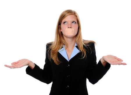 Young executive with adhesive bandage over mouthの写真素材