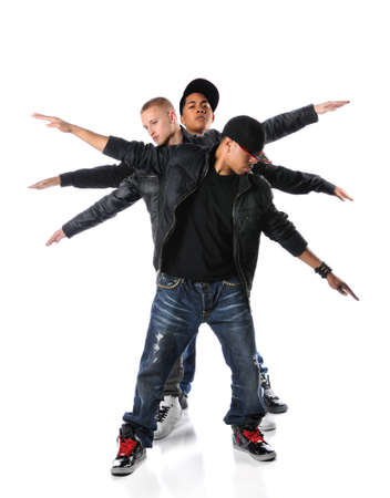Three hip hop young men with arms stretched over a white background Three hip hop young men with arms stretched over a white background
