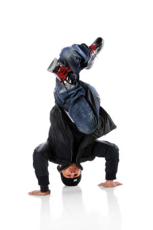 African American hip hop dancer performing a head standの写真素材