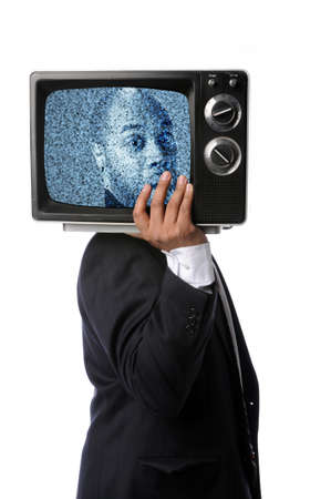 Businessman holding television with image with static on screenの写真素材