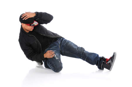 African American hip hop dancer performing isolated over white backgroundの写真素材