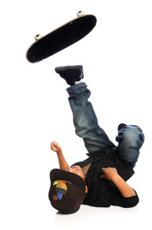 Young African American skateboarder falling isolated over white background