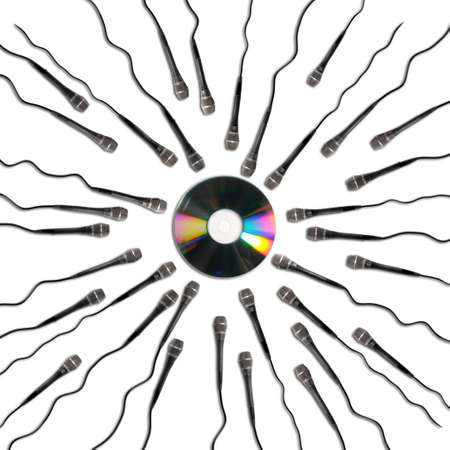 Microphones with cords moving toward digital CD - Concept of digital revolutionの写真素材