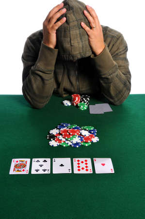 Poker player holding head in despairのeditorial素材