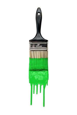 Paintbrush with dripping green paint isolated over white backgroundの写真素材