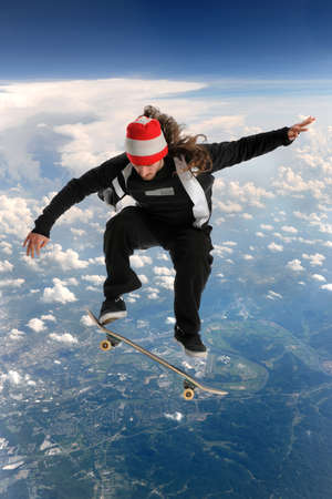 Skateboarder high above the clouds performing a trick