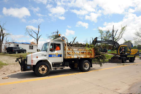 SAINT LOUIS, MISSOURI - APRIL 26: Clean up after tornados hit the Saint Louis area on Friday April...