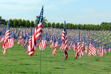 SAINT LOUIS, MO - SEPTEMBER 13: Nearly 3000 flags each with the name of the victims of 9-11 wave outside the St. Louis Art Museum. September 13, 2011 in Saint Louis, Missouriのeditorial素材