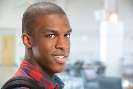 Portrait of young African American student inside schoolの写真素材
