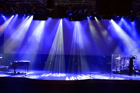 Stage with light beams and pianoのeditorial素材