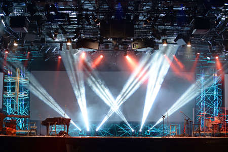 Concert lights on stage with assortment of musical instrumentsのeditorial素材